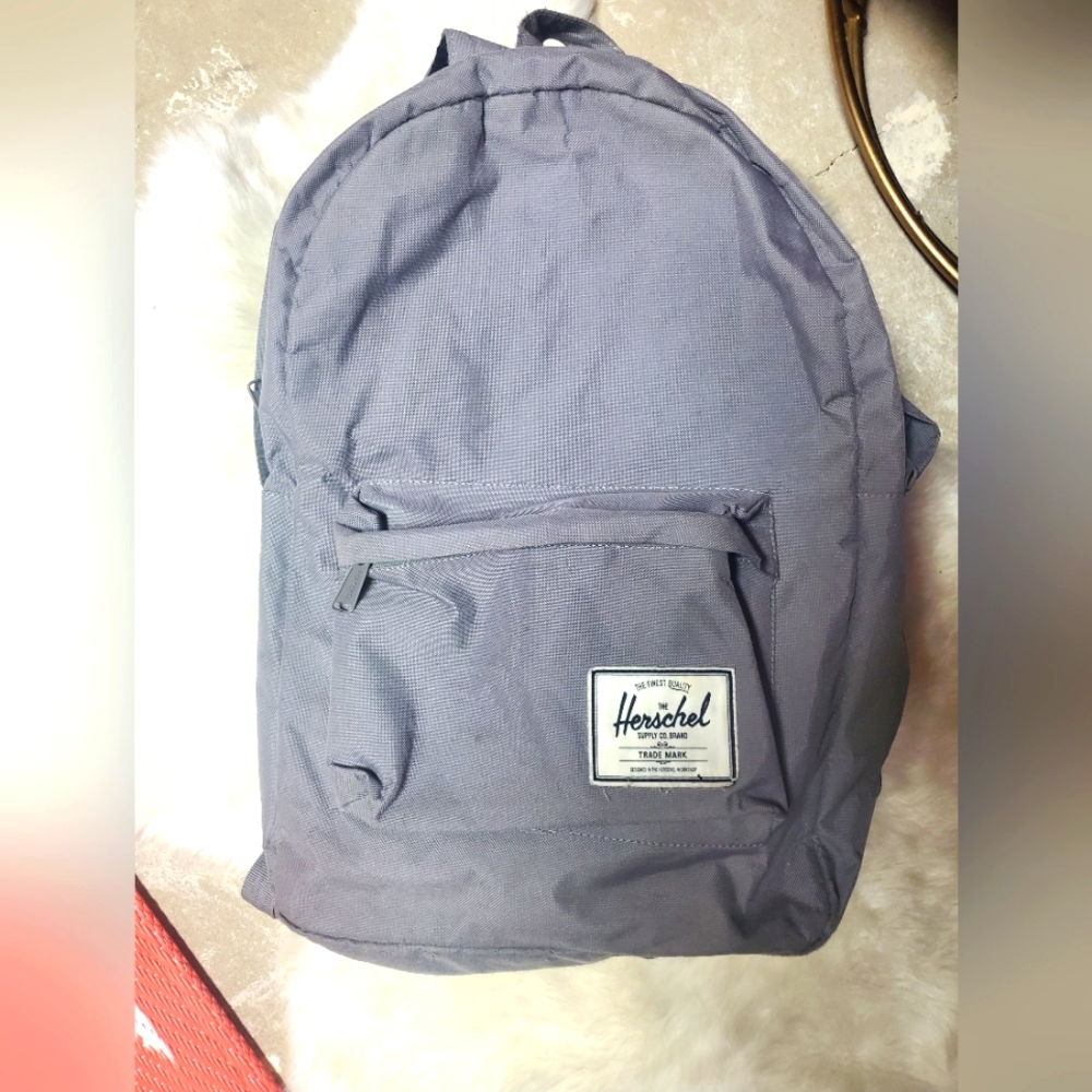 Herschel gray backpack with red liner